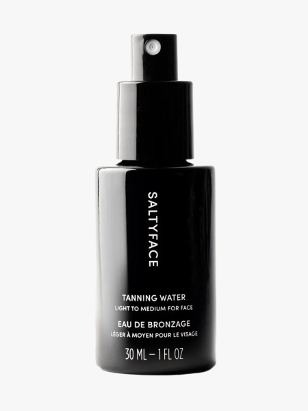 Saltyface Tanning Water in branded component on a light gray background